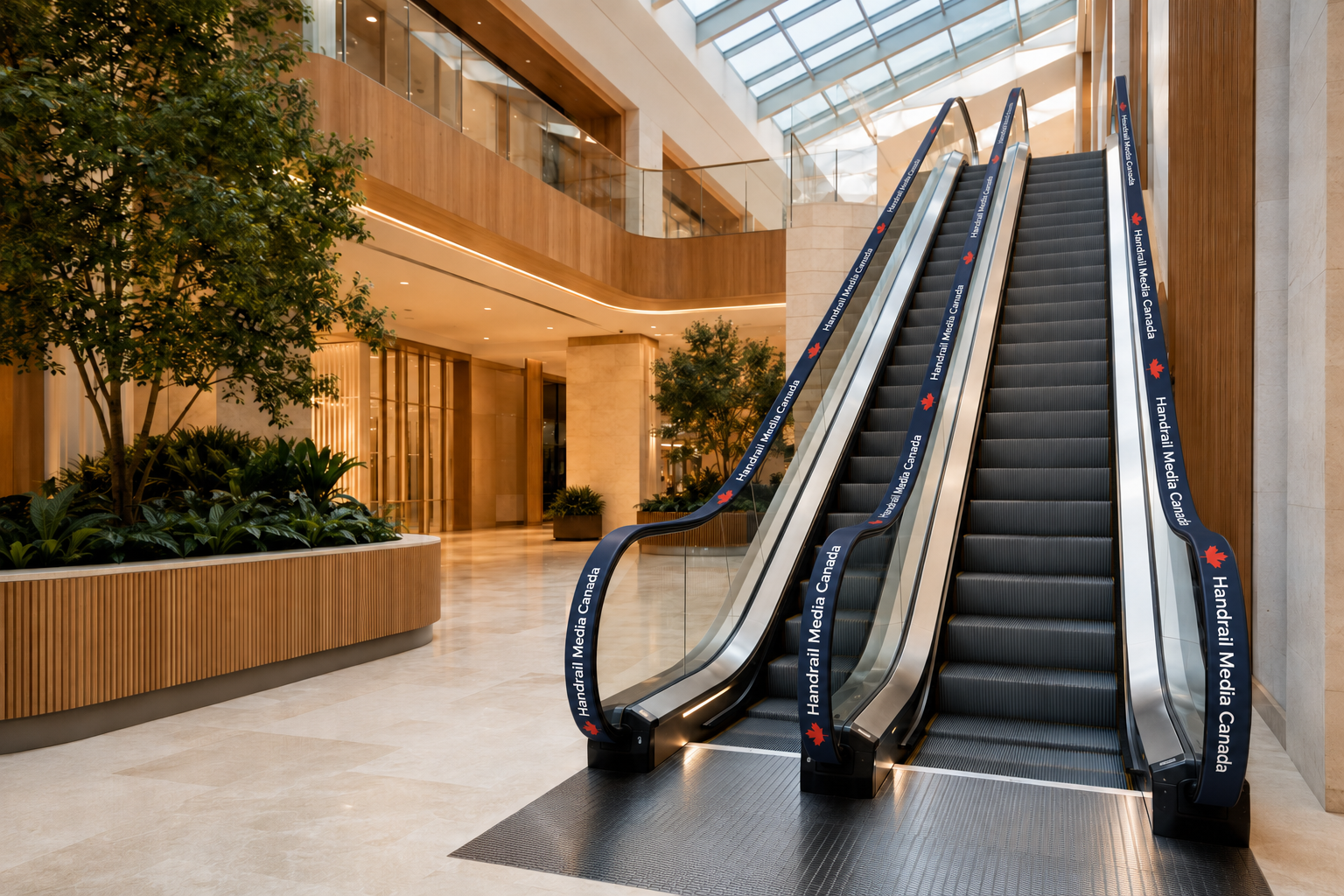 Contemporary shopping centre with escalators and subtly branded moving handrails